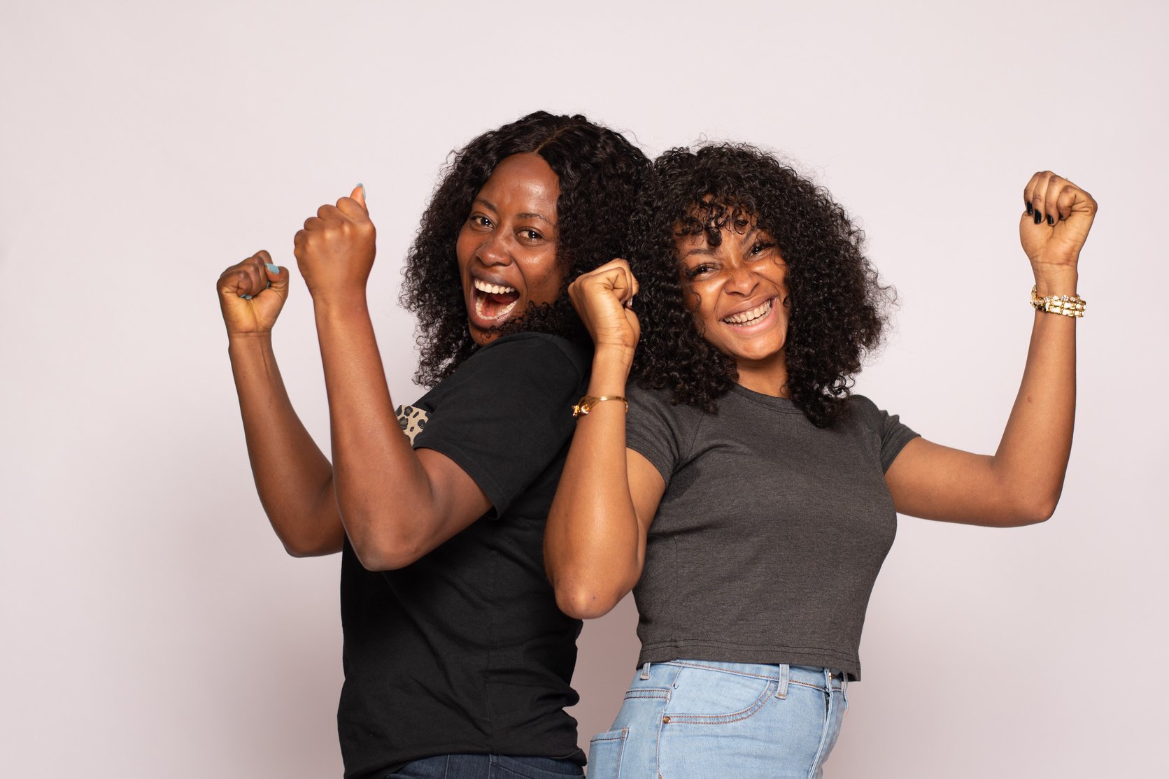 two african girls excited and rejoicing